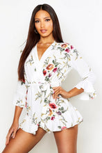 Load image into Gallery viewer, Wrap Floral Ruffle Hem Romper
